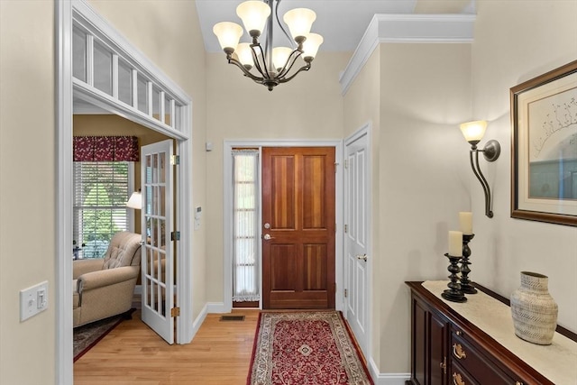 89 Cortland Dr Unit 89, North Andover, MA 01845 - entrance foyer with a chandelier, light wood-style floors, baseboards, and a towering ceiling