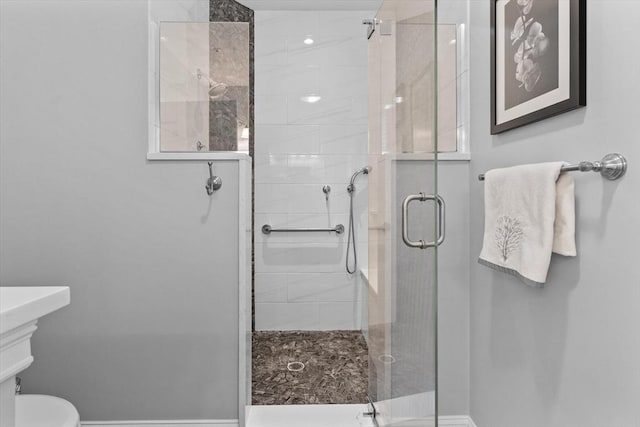 89 Cortland Dr Unit 89, North Andover, MA 01845 - full bathroom featuring baseboards, a shower stall, and toilet