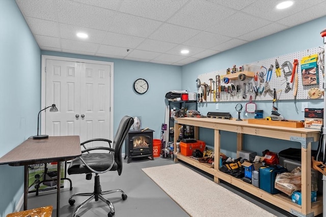 89 Cortland Dr Unit 89, North Andover, MA 01845 - office space with concrete flooring, a workshop area, a wood stove, recessed lighting, and a paneled ceiling