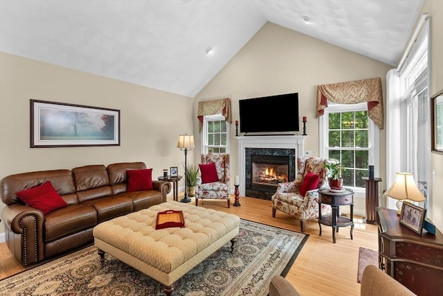 89 Cortland Dr Unit 89, North Andover, MA 01845 - living area featuring light wood-style floors, a high end fireplace, and high vaulted ceiling