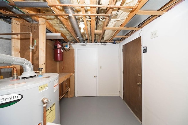 unfinished basement featuring gas water heater