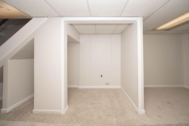 bonus room with baseboards and carpet floors