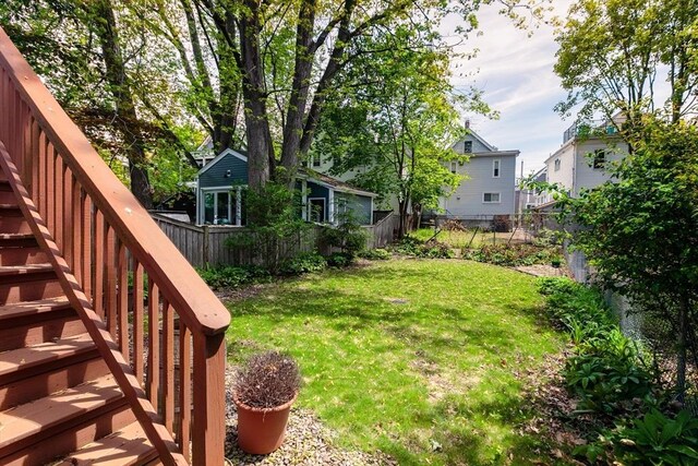 view of yard featuring stairway