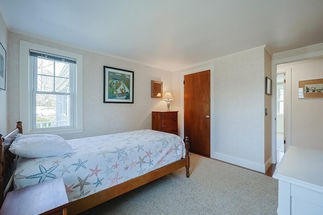 bedroom with ornamental molding