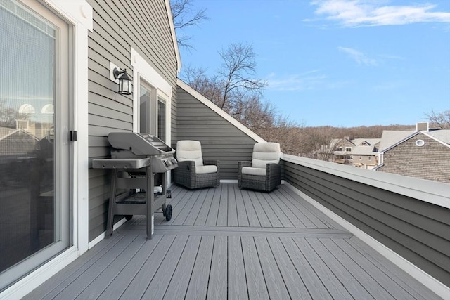 wooden terrace with area for grilling