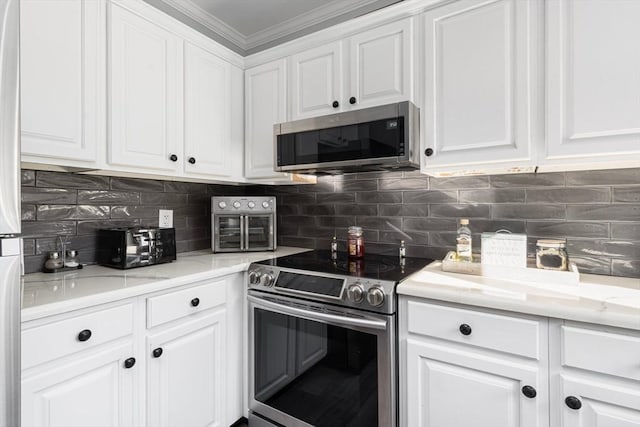 kitchen with white cabinetry and appliances with stainless steel finishes