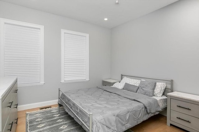 755 Boylston St Unit 1, Brookline, MA 02467 - bedroom with light wood-style flooring, baseboards, and recessed lighting