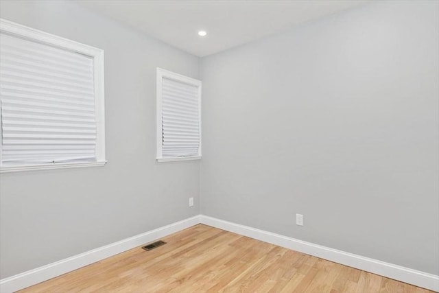 755 Boylston St Unit 1, Brookline, MA 02467 - unfurnished room with baseboards, wood finished floors, and recessed lighting