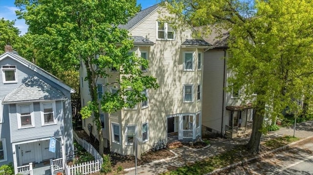 755 Boylston St Unit 1, Brookline, MA 02467 - view of side of home featuring fence