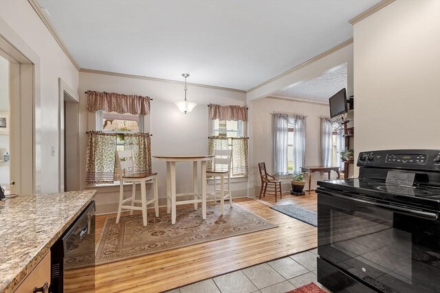 98 Mechanic St, Orange, MA 01364 - kitchen featuring black range with electric stovetop, crown molding, healthy amount of natural light, dishwashing machine, and light tile patterned floors
