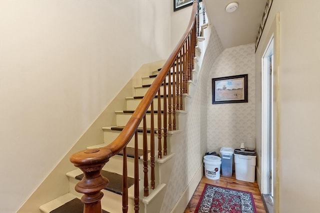 98 Mechanic St, Orange, MA 01364 - staircase featuring wallpapered walls and wood finished floors