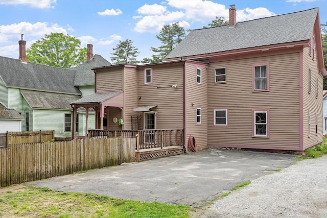 98 Mechanic St, Orange, MA 01364 - back of property featuring a chimney and a shingled roof