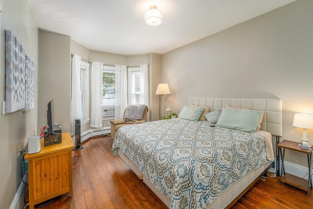 646 E 7th St Unit 1, Boston, MA 02127 - bedroom featuring hardwood / wood-style flooring and baseboard heating