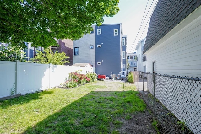 646 E 7th St Unit 1, Boston, MA 02127 - fenced backyard with a patio