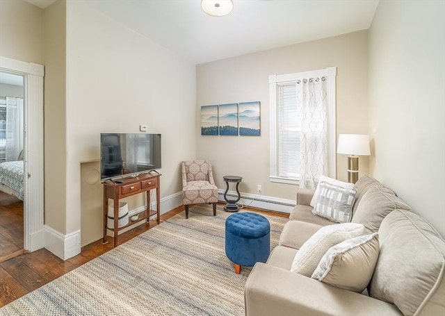 646 E 7th St Unit 1, Boston, MA 02127 - living area with baseboard heating and wood finished floors
