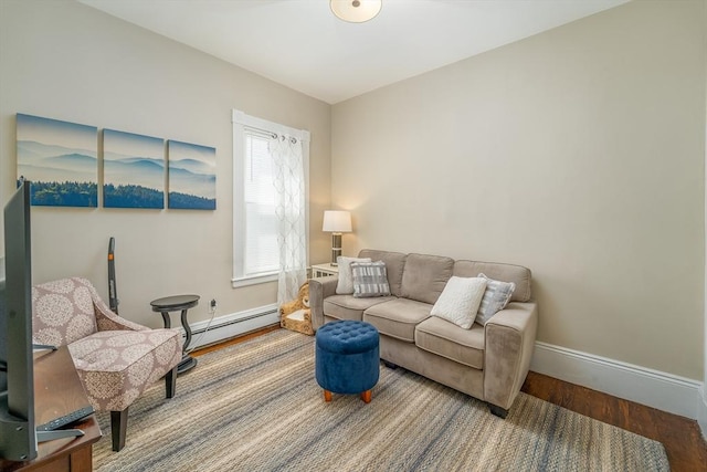 646 E 7th St Unit 1, Boston, MA 02127 - living area featuring wood finished floors and baseboard heating