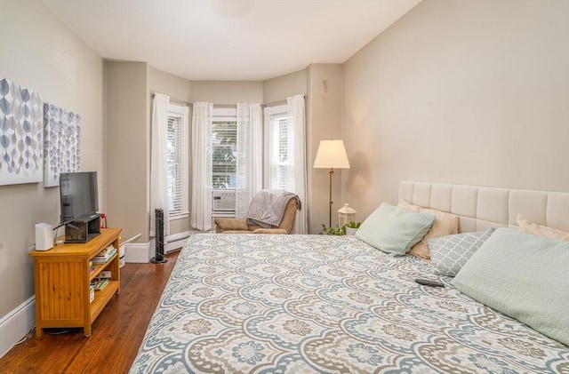 646 E 7th St Unit 1, Boston, MA 02127 - bedroom featuring dark wood finished floors and baseboards
