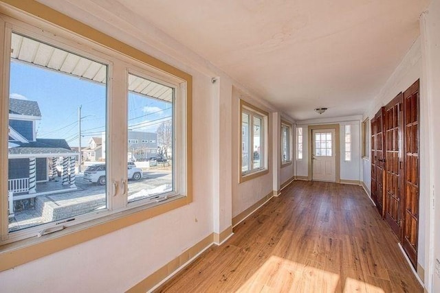 interior space with hardwood / wood-style flooring