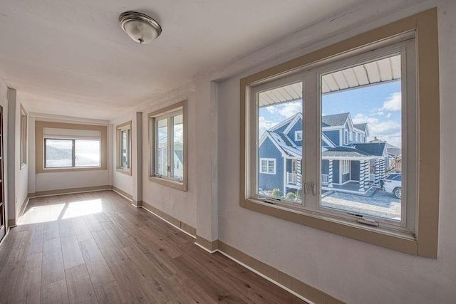 unfurnished room featuring wood-type flooring