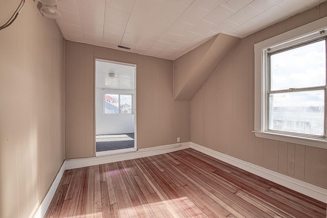 bonus room featuring hardwood / wood-style floors