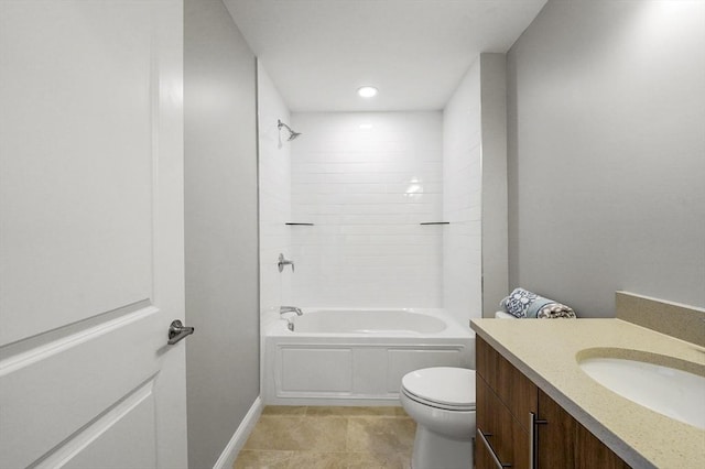 full bath featuring tile patterned floors, toilet,  shower combination, baseboards, and vanity