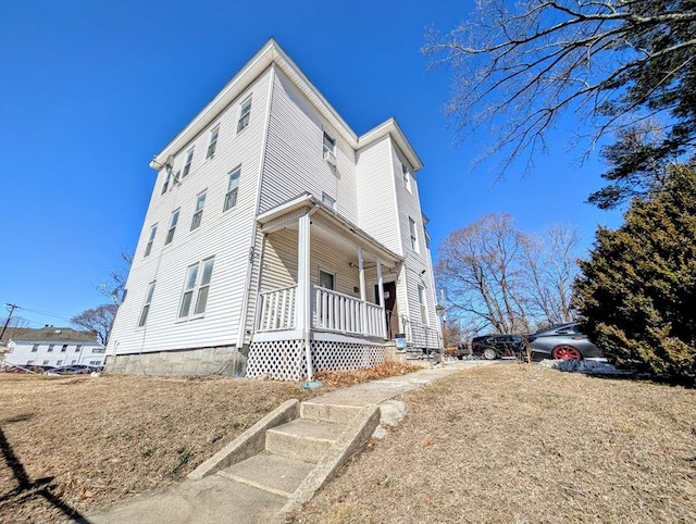 view of home's exterior featuring a porch