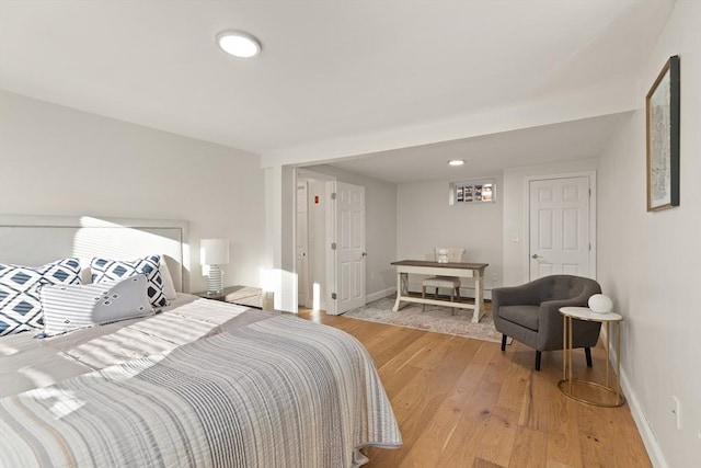 bedroom featuring light hardwood / wood-style floors