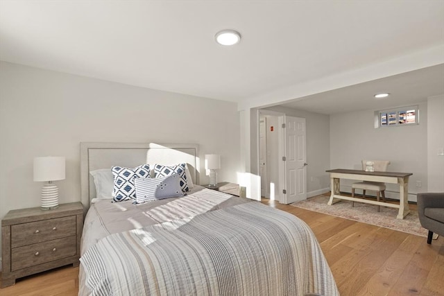 bedroom featuring light wood-type flooring