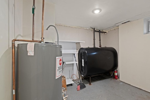 utility room with water heater