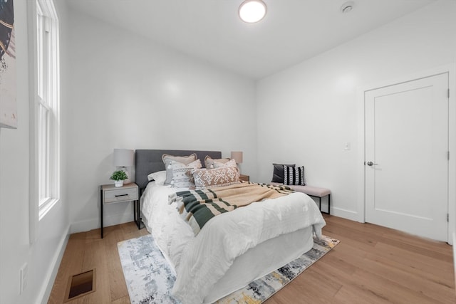 bedroom featuring light wood-type flooring