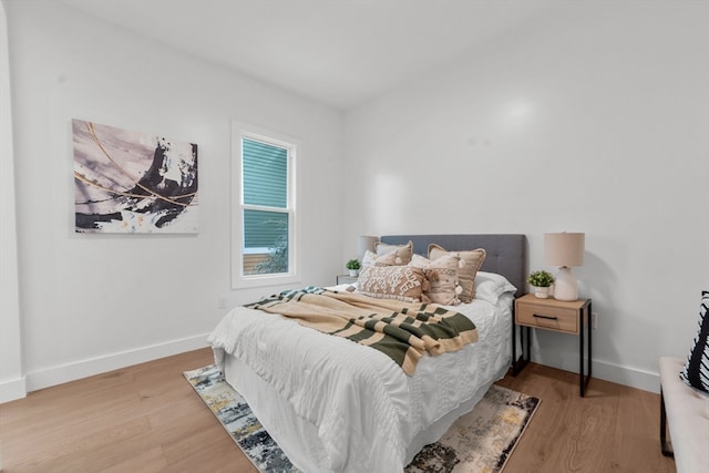 bedroom with light hardwood / wood-style flooring