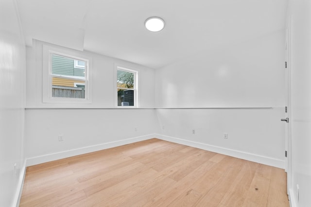 unfurnished room featuring light hardwood / wood-style floors