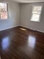 19 Fresh Pond Cir, Plymouth, MA 02360 - empty room featuring baseboards and wood finished floors