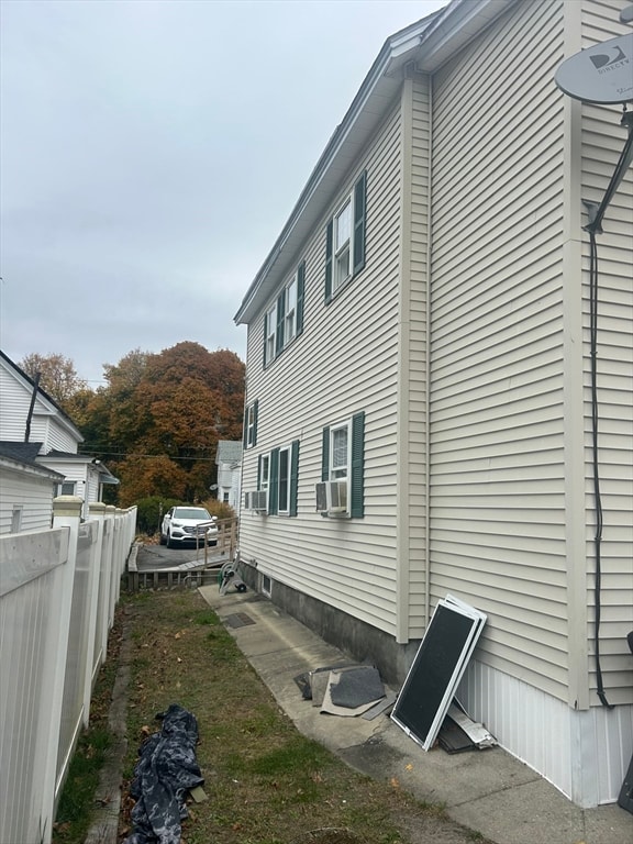 view of property exterior featuring cooling unit