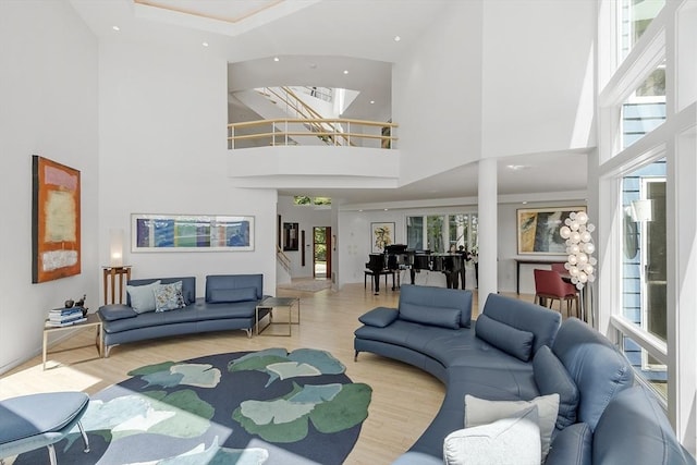 389 River Rd, Carlisle, MA 01741 - living area with a towering ceiling, wood finished floors, recessed lighting, and a skylight