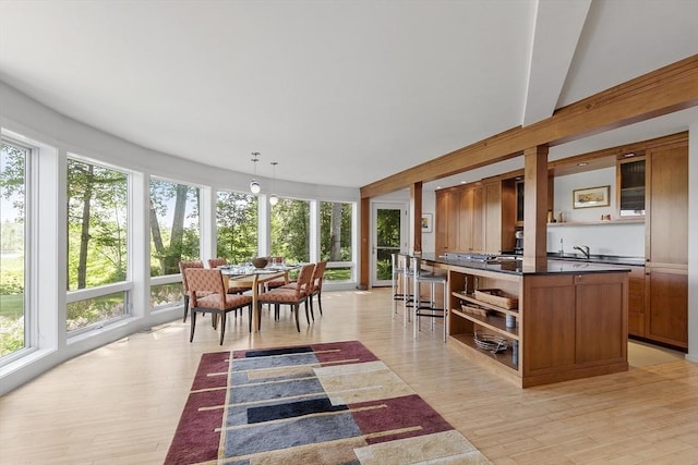 389 River Rd, Carlisle, MA 01741 - sunroom with healthy amount of natural light, wood finished floors, and a wooden deck