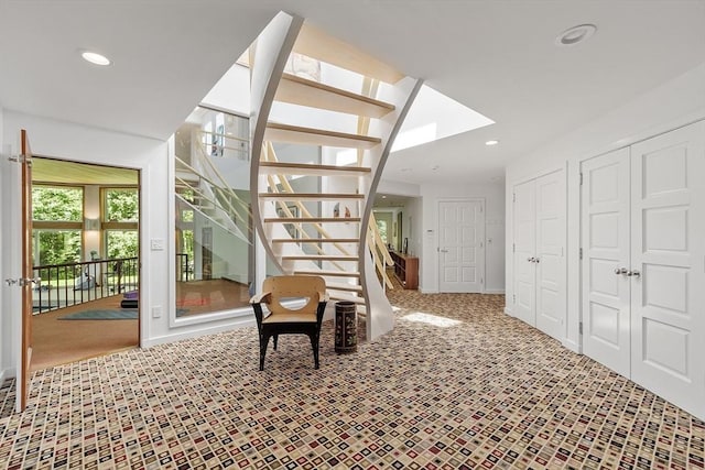 389 River Rd, Carlisle, MA 01741 - stairway with recessed lighting and carpet floors