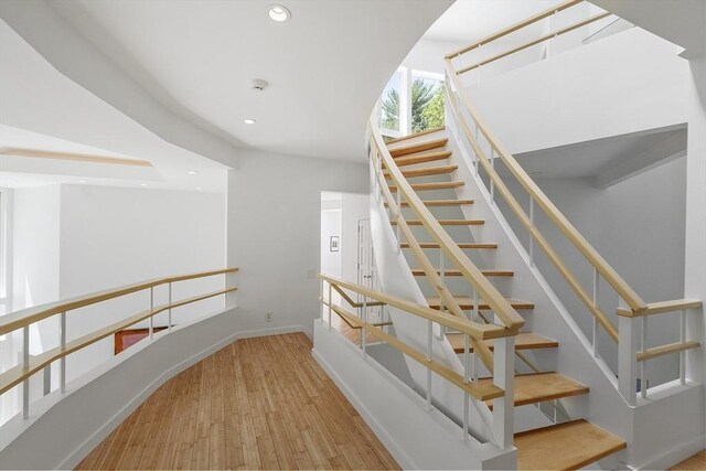 389 River Rd, Carlisle, MA 01741 - stairs featuring recessed lighting and wood finished floors