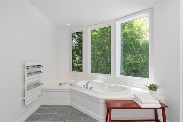 389 River Rd, Carlisle, MA 01741 - bathroom featuring a garden tub and tile patterned floors