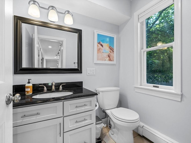 14 Belmont St Unit C, Somerville, MA 02143 - bathroom featuring baseboard heating and vanity