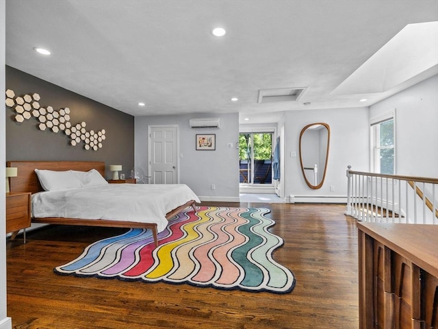 14 Belmont St Unit C, Somerville, MA 02143 - bedroom with an AC wall unit, attic access, multiple windows, recessed lighting, and wood finished floors
