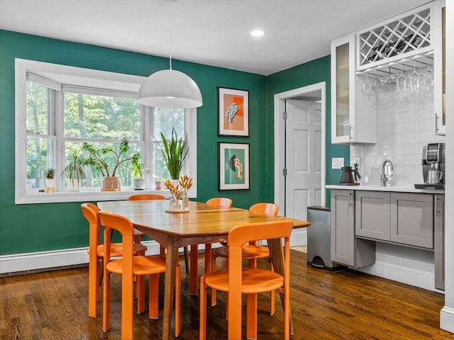 14 Belmont St Unit C, Somerville, MA 02143 - dining room with wet bar, dark wood finished floors, recessed lighting, and a baseboard radiator