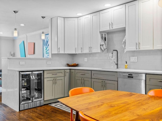 14 Belmont St Unit C, Somerville, MA 02143 - kitchen featuring wine cooler, stainless steel dishwasher, crown molding, gray cabinetry, and backsplash