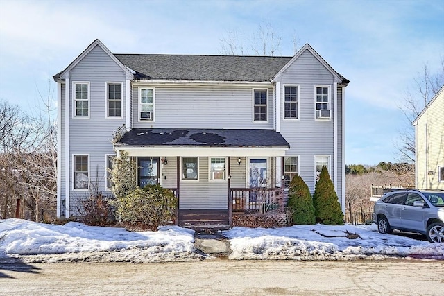 traditional-style house with covered porch