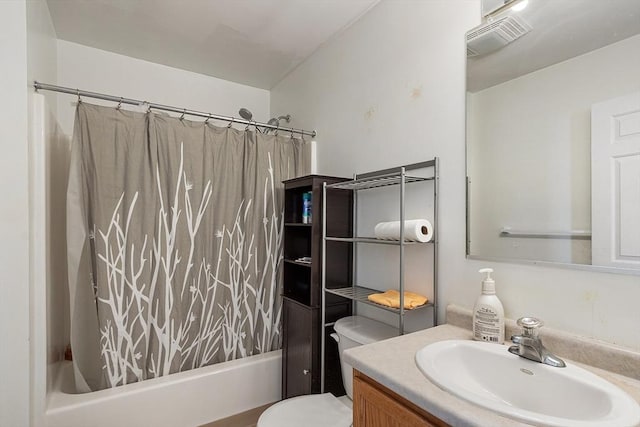 full bathroom featuring toilet, shower / tub combo, visible vents, and vanity