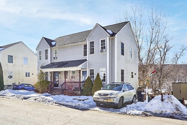 traditional-style home with covered porch