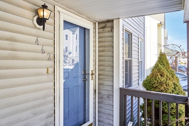 doorway to property with a porch