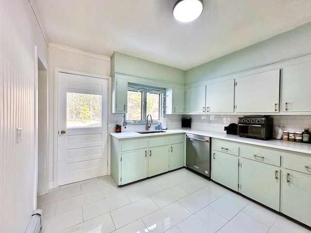 kitchen featuring tasteful backsplash, a baseboard heating unit, sink, and stainless steel dishwasher