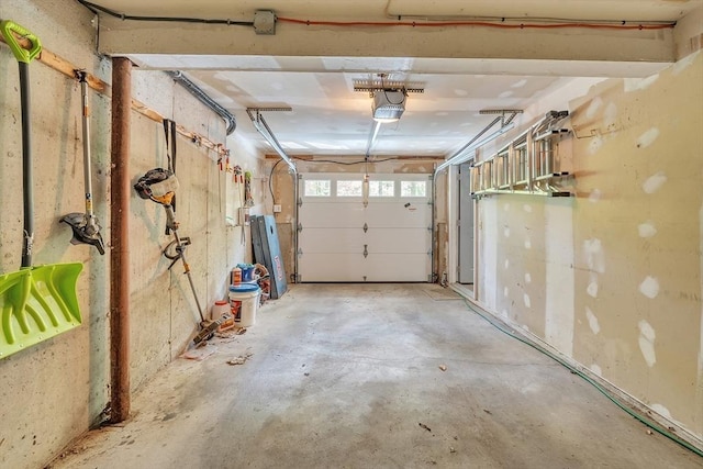 garage featuring a garage door opener
