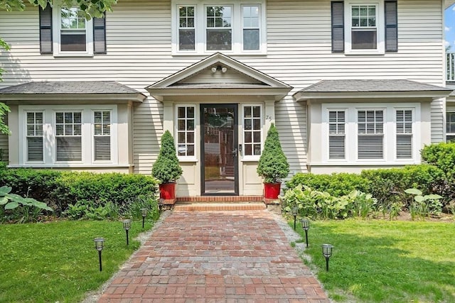 75 Hillcroft Ave, Worcester, MA 01606 - view of exterior entry featuring a lawn
